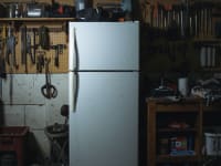 An AI-created image of a refrigerator in a garage