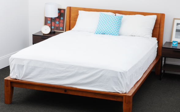 Brooklinen bed sheets are shown on a bed for testing in the Reviewed labs.