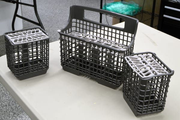 Cutlery basket divided into three sections