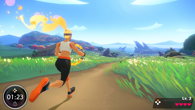 A fit woman with a flaming ponytail runs through a track on grass.