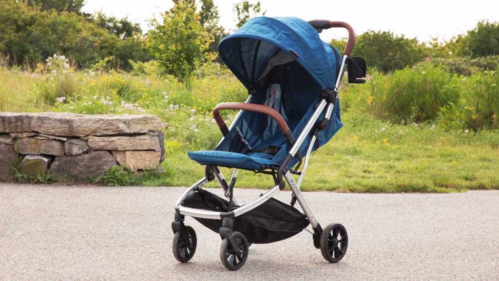 The Bombi Bebee Stroller in an outdoorsy setting.