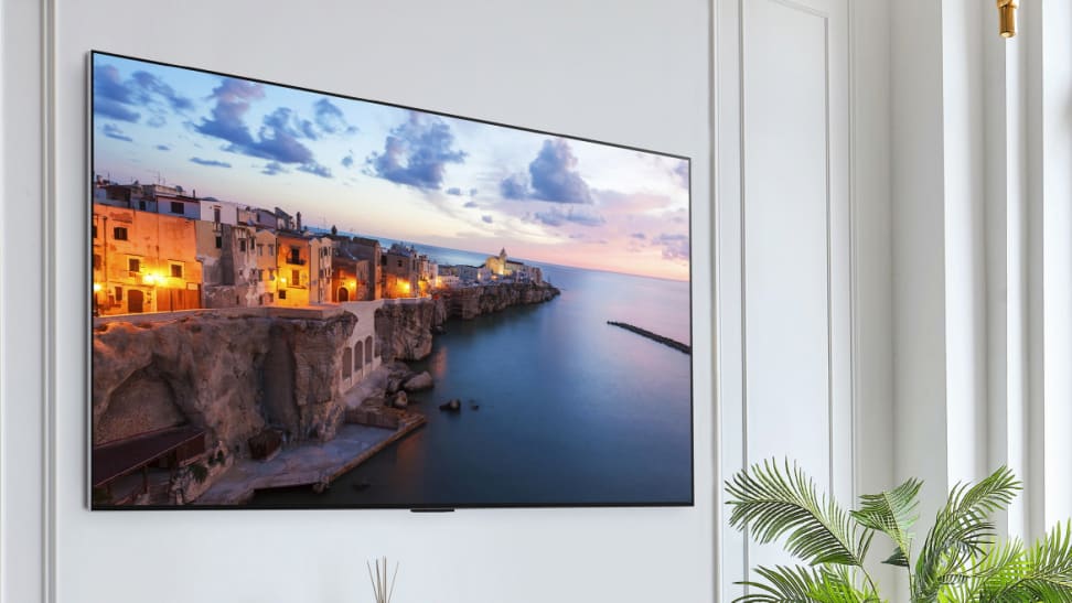 The wall-mounted LG G3 OLED evo TV displaying 4K content in a living room setting