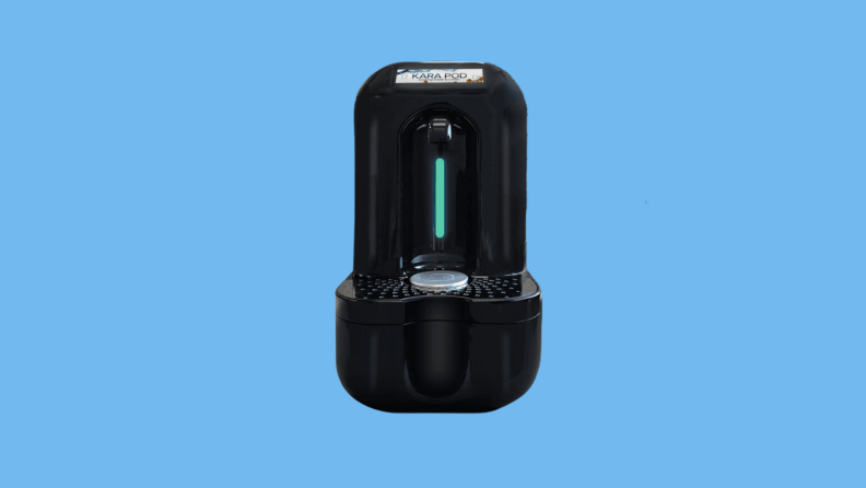 The Kara Pod water and coffee dispenser on a blue background.