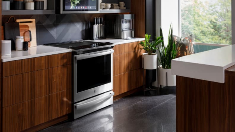 A range sits in cabinetry in a kitchen setting