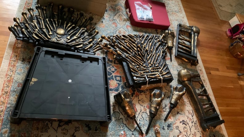 Pieces of Bone Throne chair on floor prior to assembly.