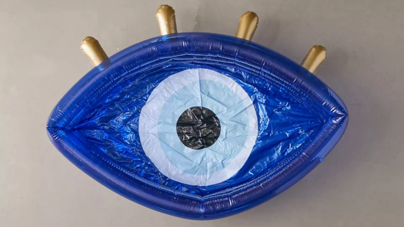 A pool shaped like a blue eye