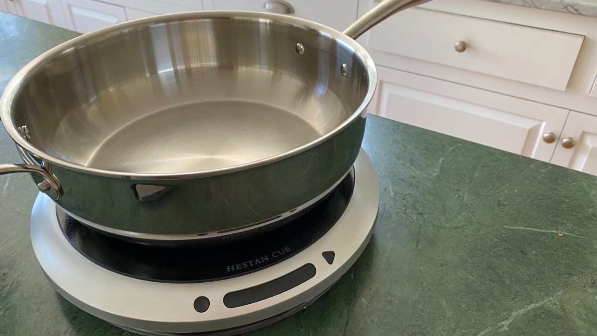 A close-up of the Hestan Cue Smart Cooking system, which includes an induction hot plate and a bluetooth-enabled 5.5-quart Chef's Pot.