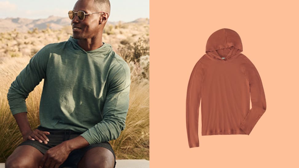 A person modeling a hooded tee right next to a display image of the same tee.