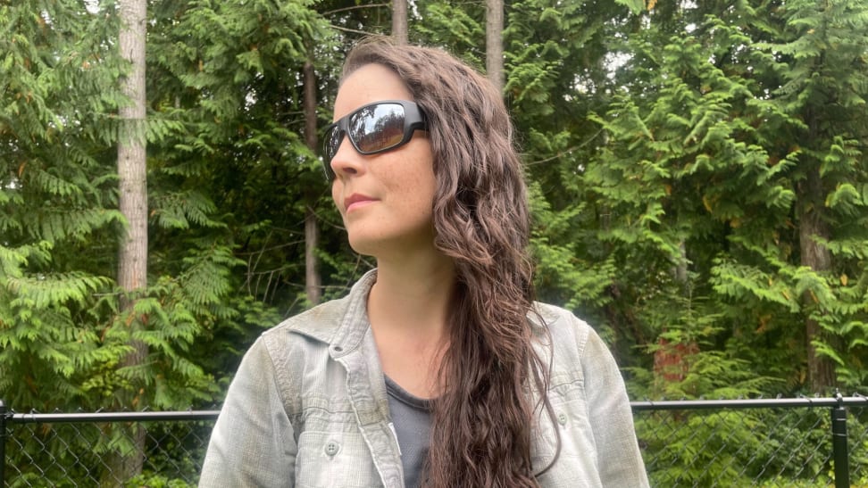 A woman sporting a pair of Bajio sunglasses outdoors.