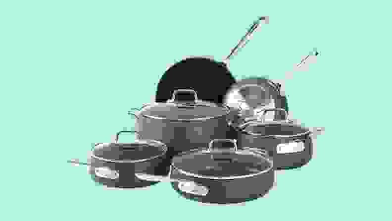 A set of All-Clad cookware against a blue background.