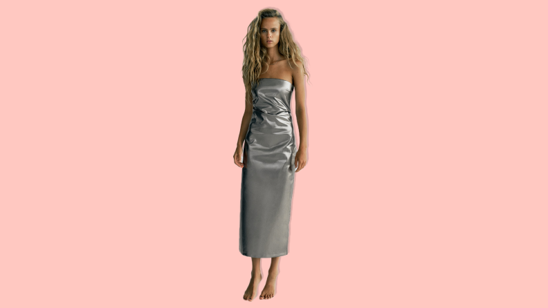 Woman in a shimmery silver dress on a