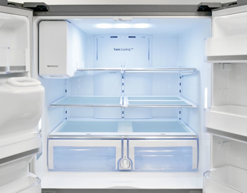 Bright LED lights and silvery trim on the shelves make the Samsung RF28HMEDBSR's spacious fridge an attractive one.