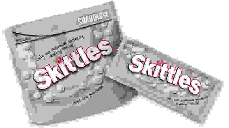 Two limited edition Skittle bags, both for Pride Month 2021, that are gray instead of rainbow colored.