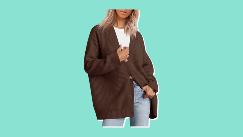 A front view of the midsection of a model wearing a draping Lillusory cardigan sweater in dark brown.