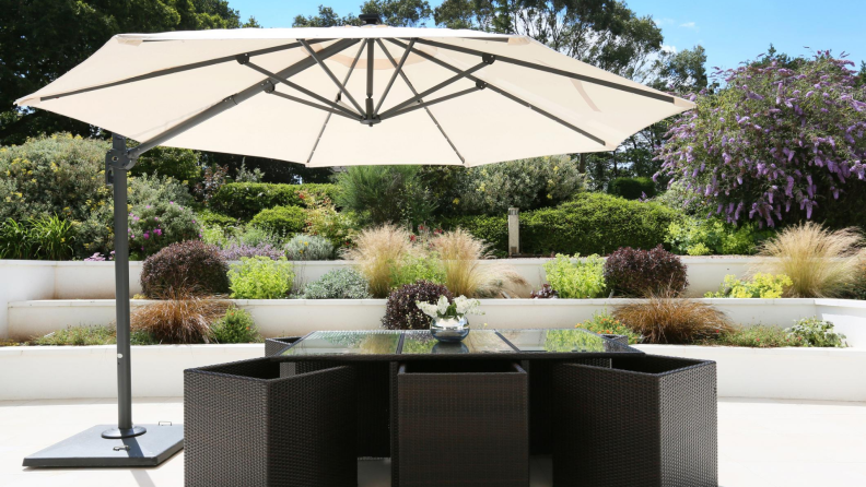 Patio dining set with large outdoor umbrella