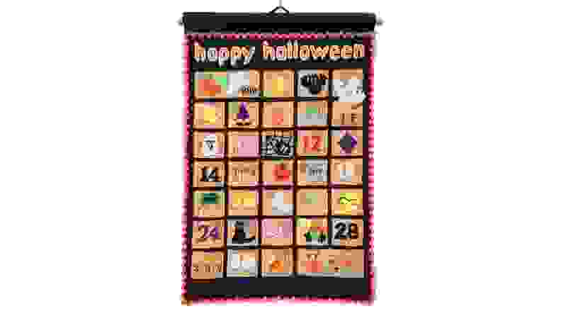 Colorful black felt Halloween-themed advent calendar.