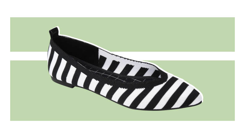 A striped black and white flat shoe.