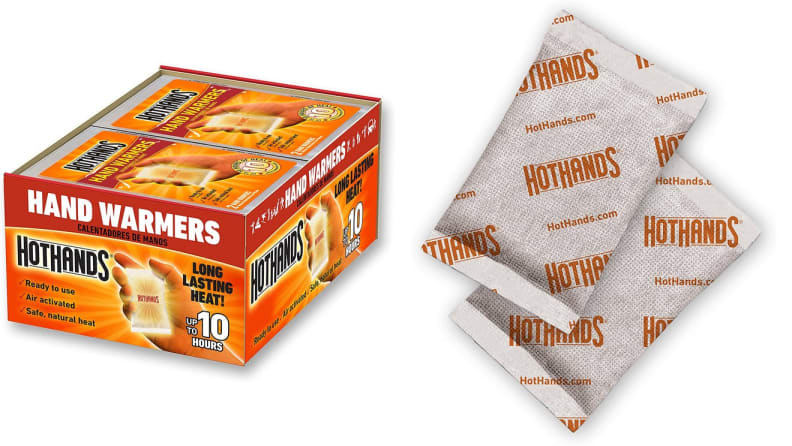 A display box and two individual packets contain HotHands hand warmers. "Long lasting heat! Up to ten hours," the package reads.