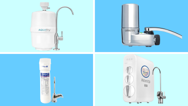 Four water filters on a blue grid background