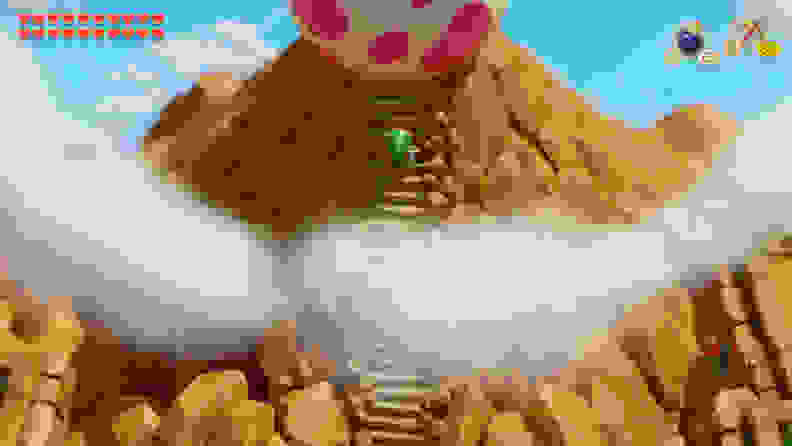 Link climbs a large mountain with a gargantuan egg on top.