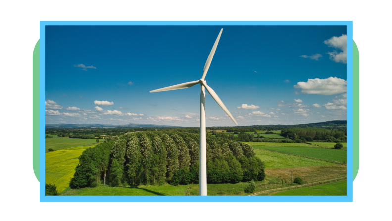 Large wind turbine outdoors in large field on farm.