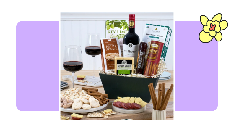 A gift basket with snacks and red wine
