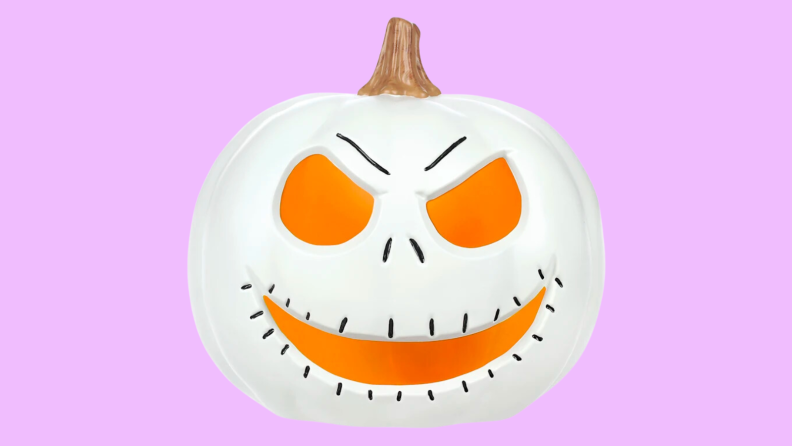 An image of a Jack Skellington-headed pumpkin decoration.
