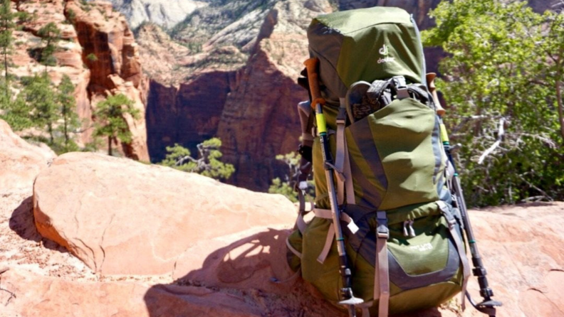 Image of deuter backpack sitting on a rock