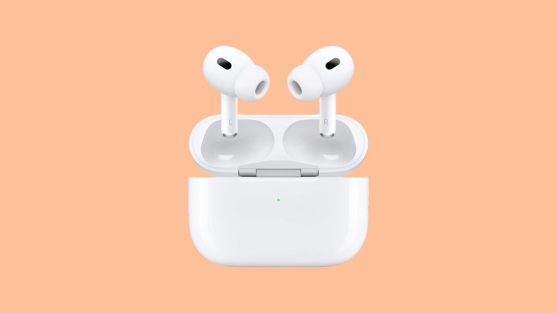 Apple AirPods on an orange background.
