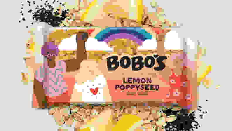 A Bobo's Lemon Poppyseed Oat Bar, against a background of crumbs.