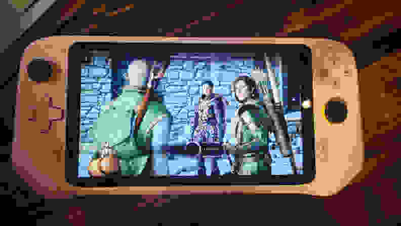 A handheld gaming console showing a game on its screen