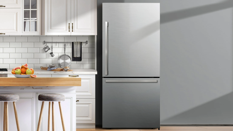 A dark stainless-steel Hisense HRB171N6ASE stands to the right of a kitchen counter.