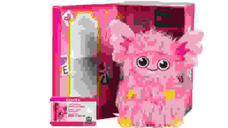 Fuzzy, pink monster toy.