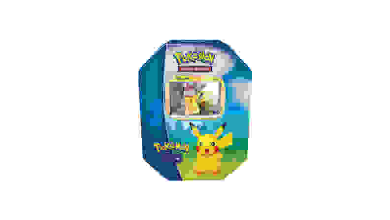 A Pokémon GO Trading Card Gift Tin in front of a white background.