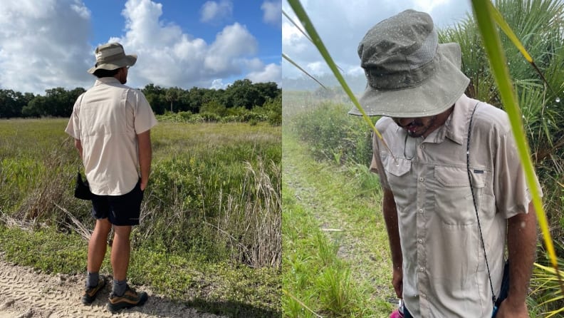 man with hands in pockets on hiking trail, man looking down at outfit by Columbia