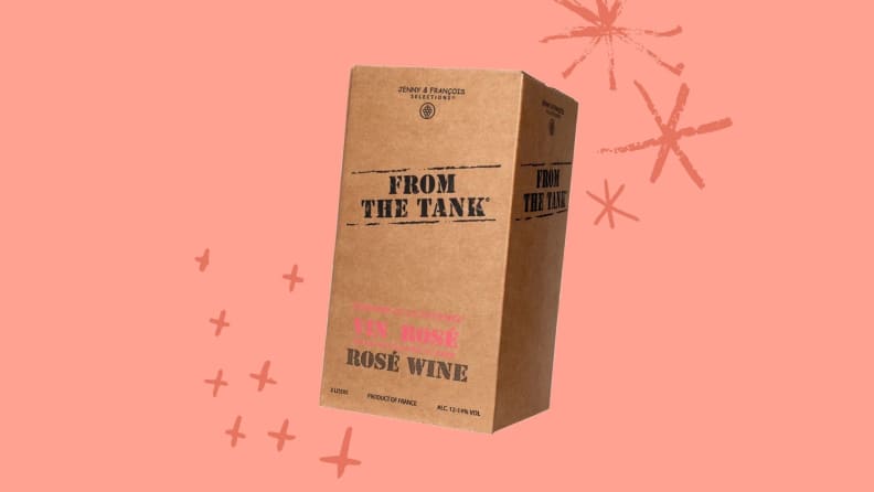 A box of From the Tank wine on a pink background with illustrated deocrations
