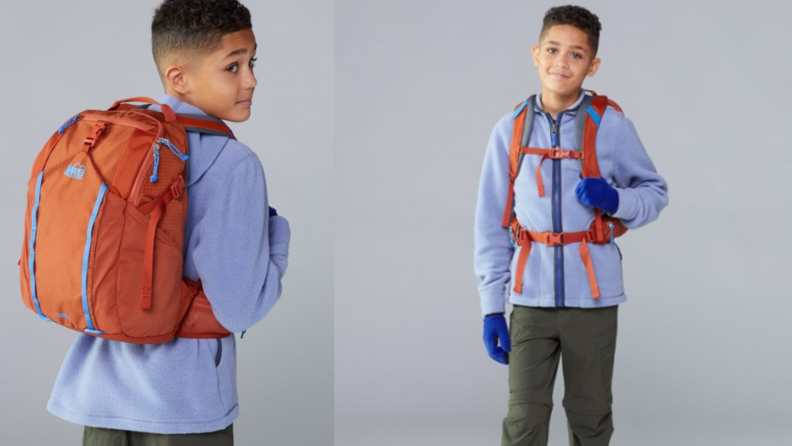 Child wearing an orange backpack