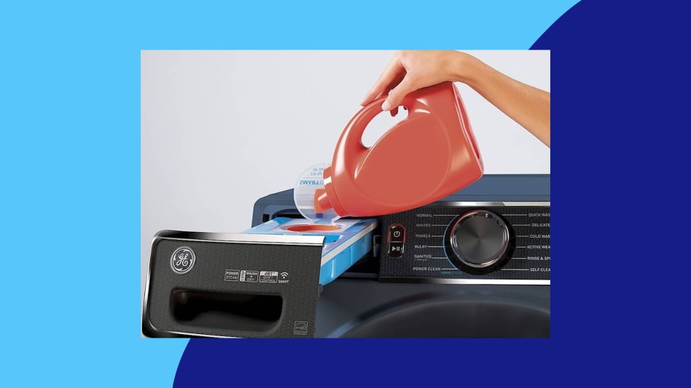 A person pouring detergent into the smart dispenser of a washing machine.