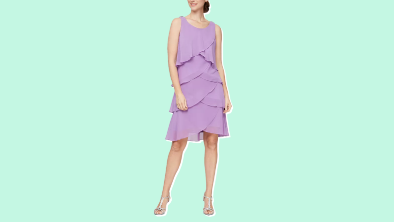 A lavender-colored chiffon dress from SL Fashions against a mint green background.
