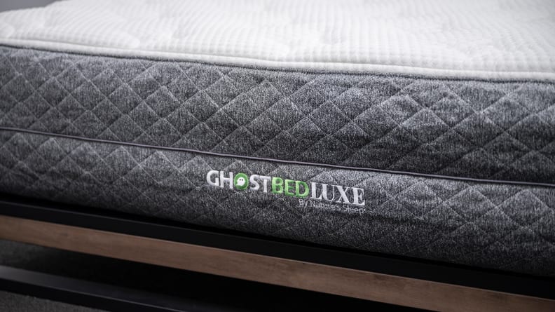 Close-up shot of the side of the mattress revealing the GhostBed logo.