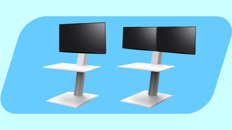 Humanscale QuickStand Eco standing desk converter on a blue background.