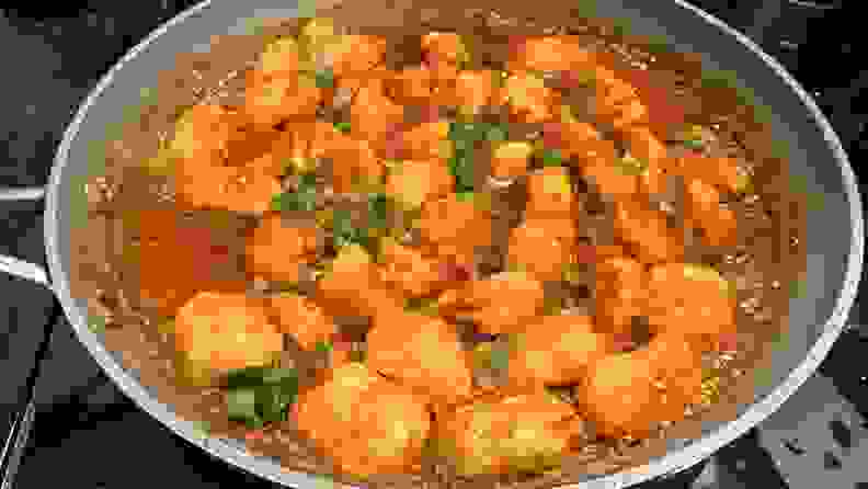A pan filled with Savory Spice's Kung Pao Chicken blend.