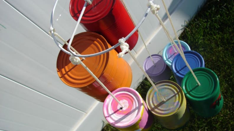 Tin cans upcycled into a colorful wind chime
