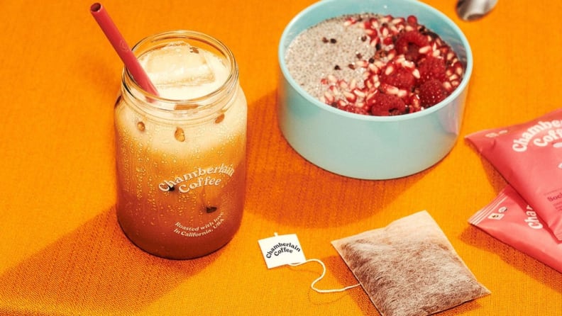 A morning brew of instant coffee against an orange background.