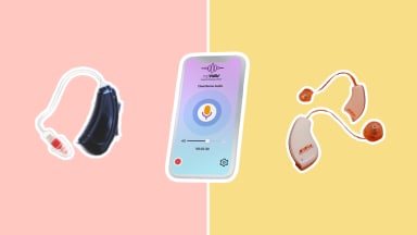 Three hearing aids and a smartphone on a pink and yellow background.