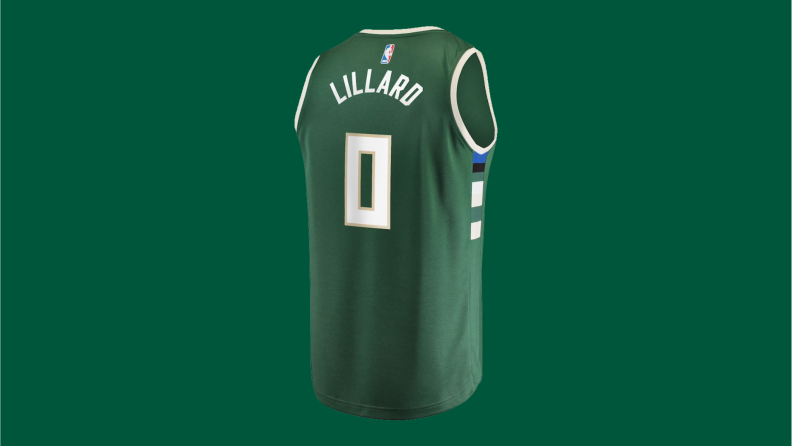 A Damian Lillard Milwaukee Bucks jersey on a green background.