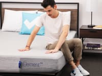 Man sitting on a bed