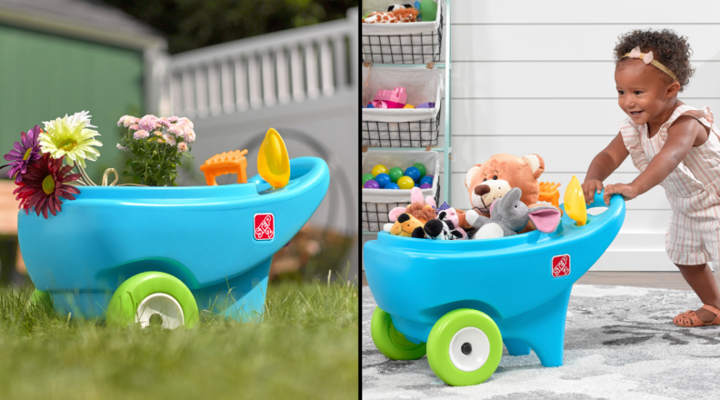 A toy wheelbarrow sits in the yard (right) and a toddler girl pushes the toy wheelbarrow (left)