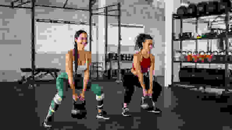 Two women exercising together.