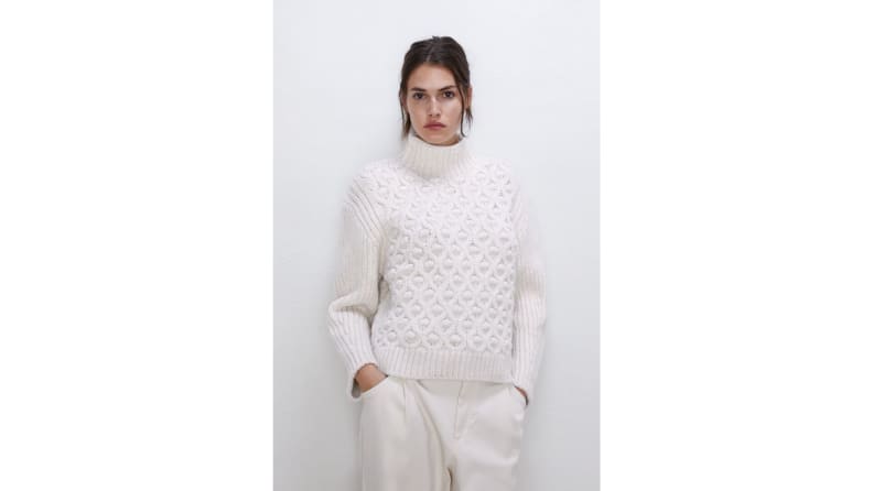 A chunky knit sweater pairs easily with jeans or skirts.